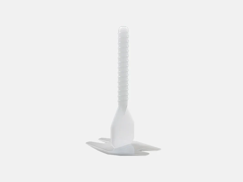 A white tile leveling spacer with a ridged stem and a broad base, presented against a light background, used to ensure even tile spacing in flooring projects.